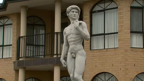David and Goliath battle over four-metre granite statue in Melbourne front yard