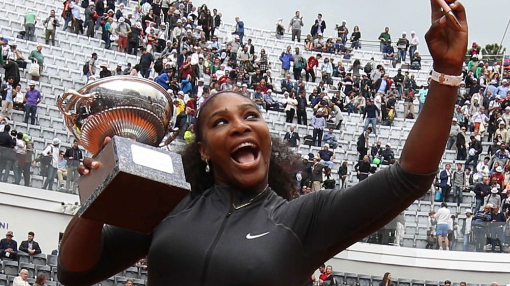 Serena snaps a selfie with her trophy.(AFP)