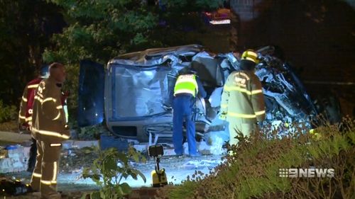 Crews worked for an hour to free the front seat passenger who became trapped in the wreckage of the crash. (9NEWS)
