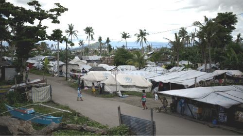 Many residents of Tacloban City are still living in tents after Super Typhoon Haiyan struck last November. (Getty)