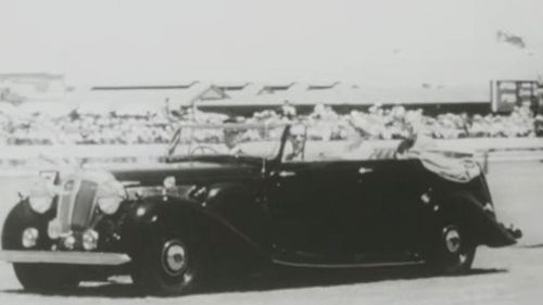 The Queen in a car on her 1954 tour of Australia