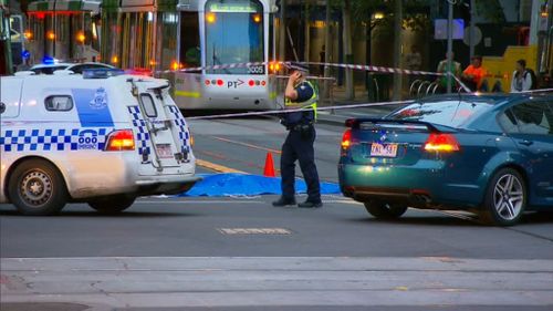 A female pedestrian has died after being hit by a truck on Collins Street in Melbourne. (9NEWS)