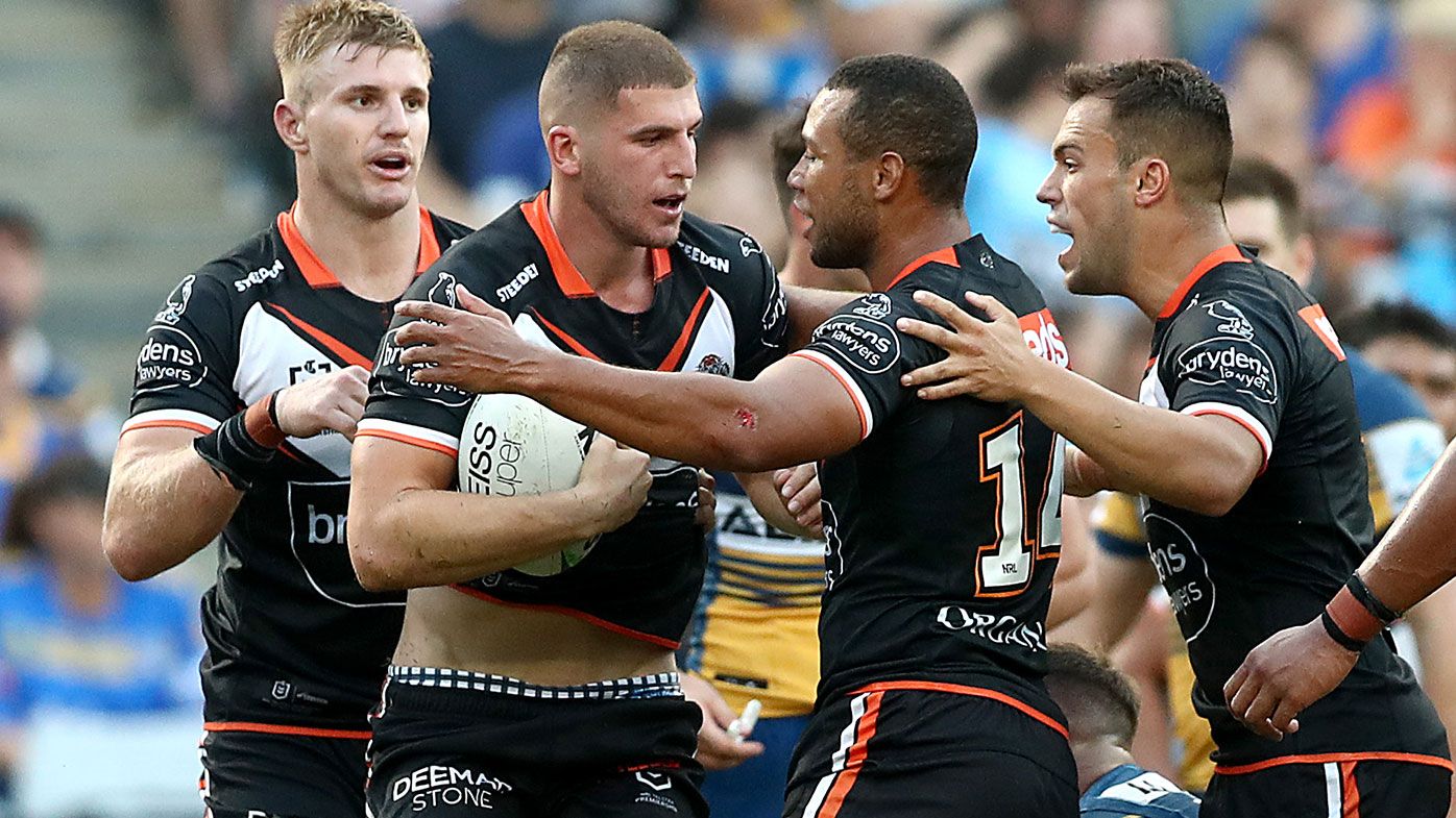 Adam Doueihi of the Tigers scores a try and celebrates during the round four NRL match between the Wests Tigers and Parramatta Eels at Stadium Australia on April 05, 2021 in Sydney, Australia. (Photo by Speed Media/Icon Sportswire via Getty Images)