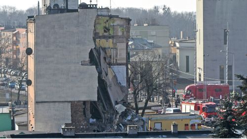 An apartment block collapsed Sunday in Poland's western city of Poznan, killing several people and injuring more than 20 others. (AAP)