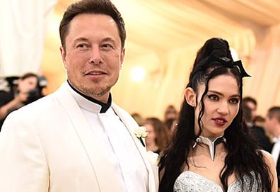 Elon Musk and Grimes (Getty)