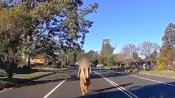 A woman has been seen laying down in front of a car on a Sydney street. Dashcam footage posted to Reddit has captured the interaction at Quakers Hill in the city&#x27;s north-west last week.