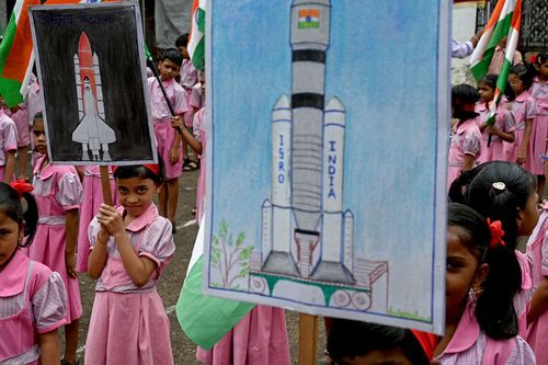 Students hold posters in support of the Chandrayaan-3 spacecraft, which is Sanskrit for "moon vehicle," in Mumbai on August 22.