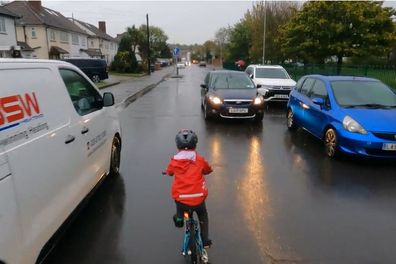 Child rides bike into oncoming traffic