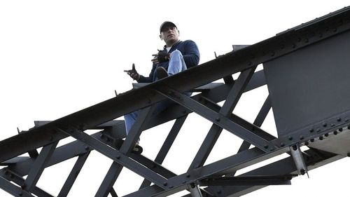 Wayne Cook, 44, climbed 75 metres up the Sydney Habour Bridge last Wednesday. (AAP)