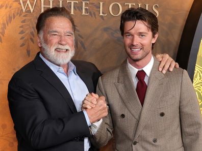 LOS ANGELES, CALIFORNIA - FEBRUARY 10: Arnold Schwarzenegger and Patrick Schwarzenegger arrive at the Los Angeles Premiere Of HBO Original Series "The White Lotus" Season 3 at Paramount Theatre on February 10, 2025 in Los Angeles, California. (Photo by Maya Dehlin Spach/WireImage)
