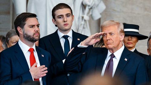 Barron Trump (centre) at his father's inauguration.