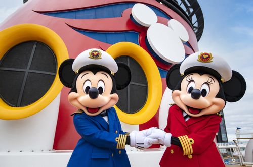 Mikey and Minnie stand on board the ship's main deck