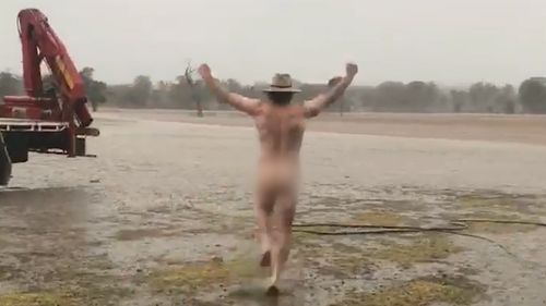 Farmer Glen Bloink celebrates the much-needed rain at his farm in Minore by running naked through the rain-soaked paddocks. Picture: Facebook Min Coleman