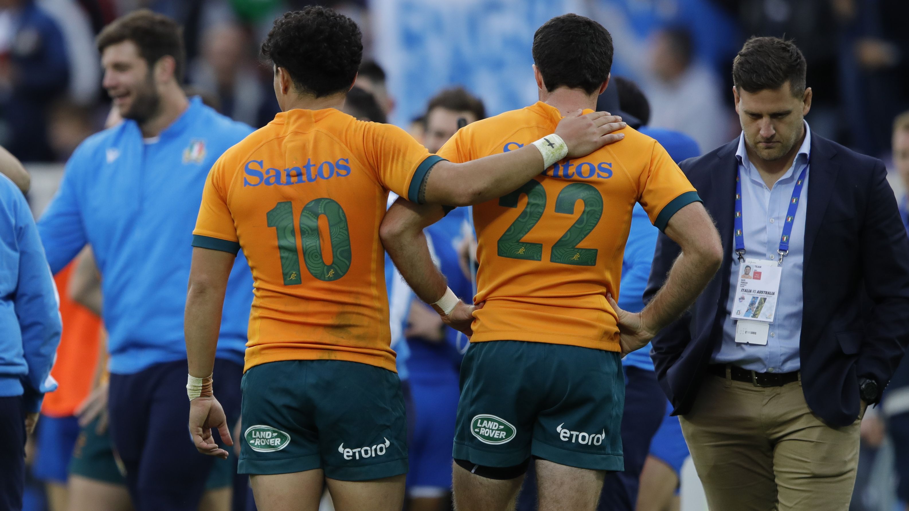 Noah Lolesio of Australia consoles his teammate Ben Donaldson.