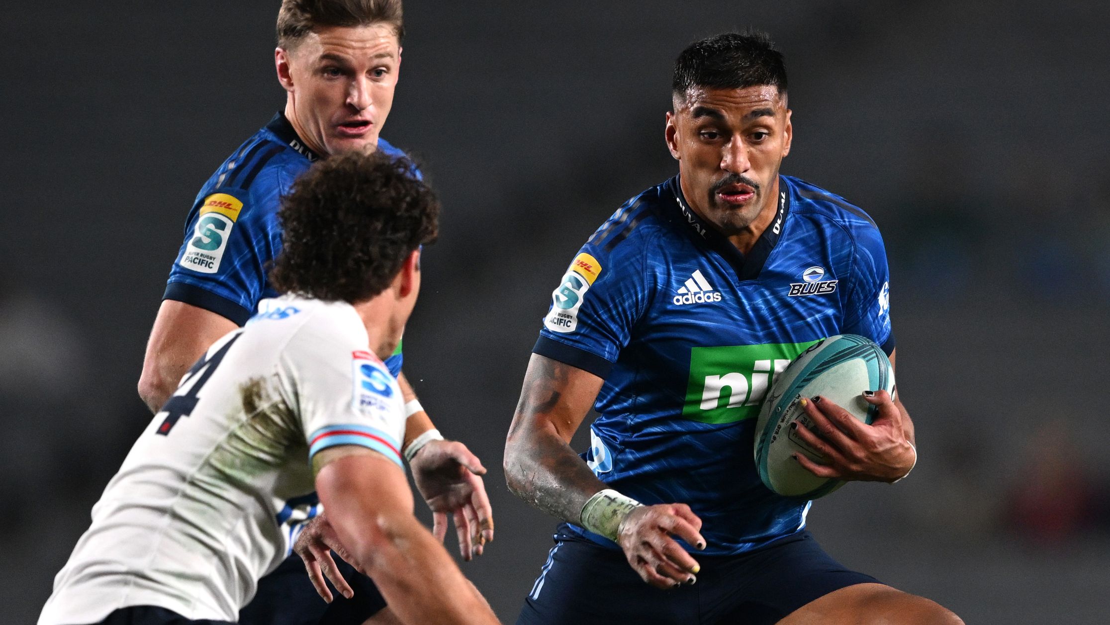 Rieko Ioane of the Blues makes a break during the Super Rugby Pacific quarter-final match between Blues and Waratahs at Eden Park.