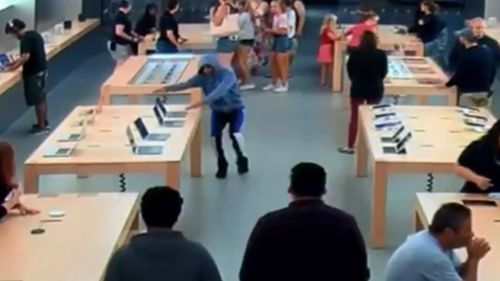 The thieves stormed into the Apple store in Fresno, Californi