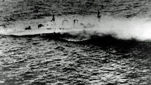 The British heavy cruiser HMS Exeter sinking in 1942. (Photo: US Navy Naval History and Heritage Command).