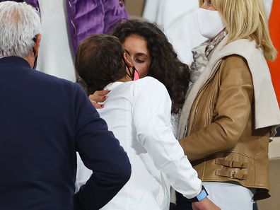 Rafael Nadal of Spain kisses his wife, Maria Francisca Perello following victory in his Men's Singles Final against Novak Djokovic of Serbia on day fifteen of the 2020 French Open at Roland Garros on October 11, 2020 in Paris, France. (Photo by Julian Finney/Getty Images)