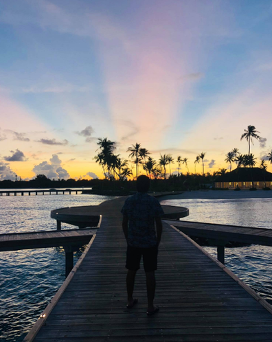 Khaled Mokhatar and Peri Abouzeid  on a pier in the Maldives