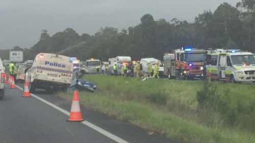 One dead, 10 injured in six-vehicle crash on the Bruce Highway, Sunshine Coast