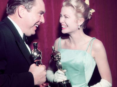 Grace Kelly celebrates at the 1955 Oscars