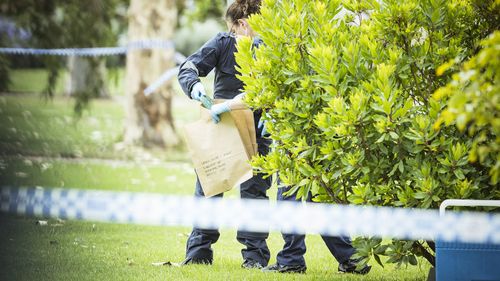 Forensic police at the Werribee South property where the woman was allegedly set on fire.