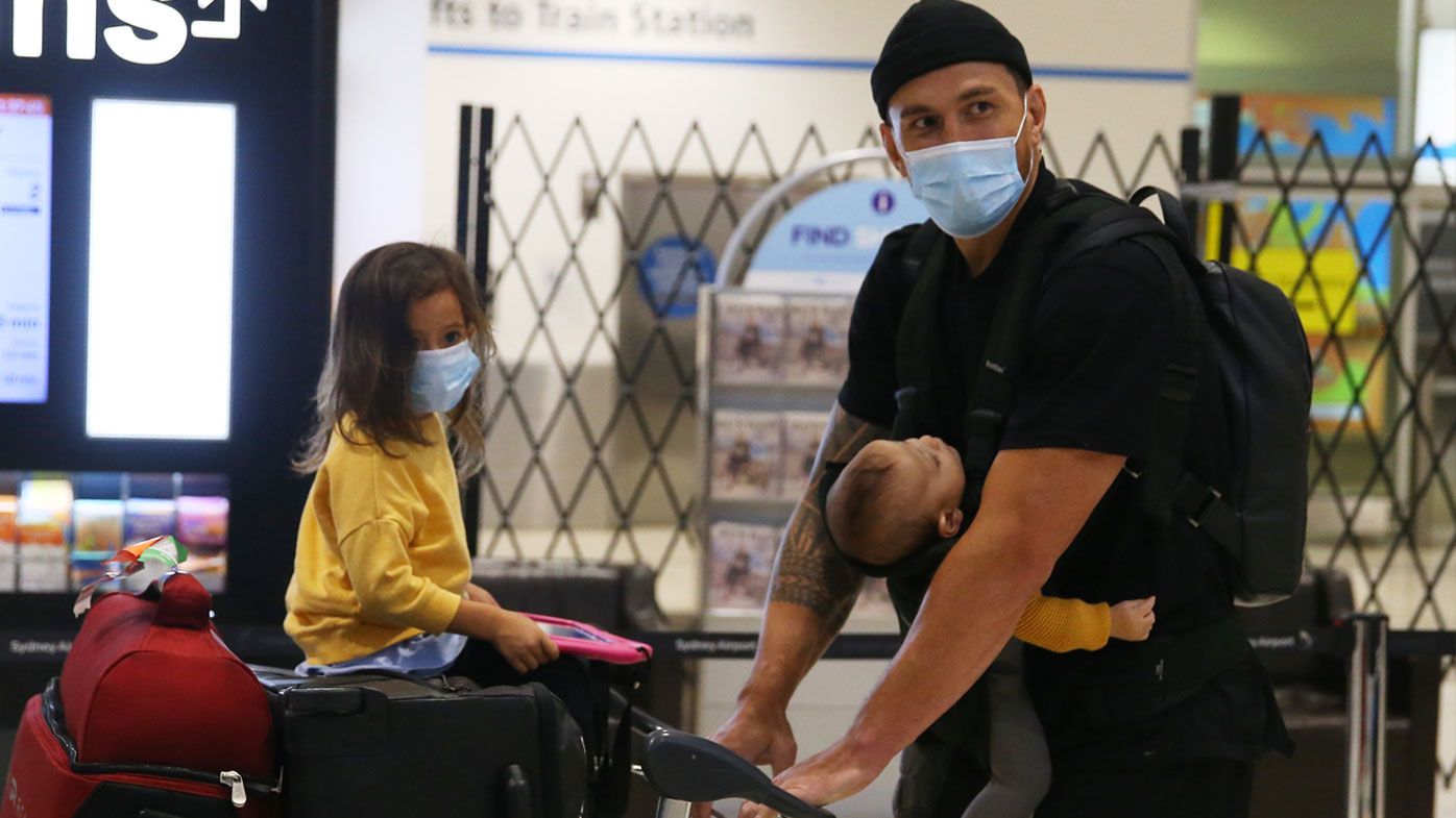 Sonny Bill Williams touches down in Sydney with family. (Getty)