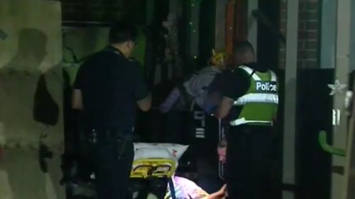 Police at the scene in Melbourne's north-west overnight. (9NEWS)
