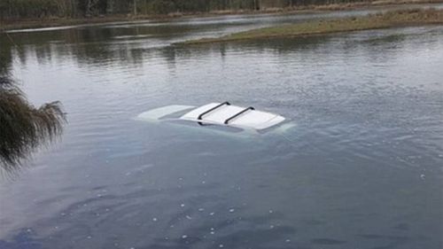 NSW man crashes car into lake after seeing spider on him