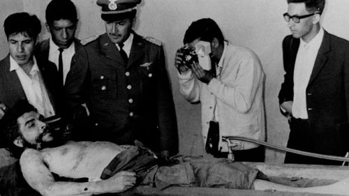Guevara's body was shown to newsmen as it lay on a concrete slab in an outdoor washroom of a hospital. The Bolivian officers said Guevara was slain October 8 in the jungle in a clash with Guerrillas. After his execution his hands were severed from his body for identification purposes
(AP Photo)