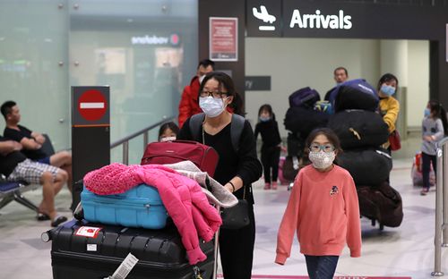 Passengers from a China Southern Airlines flight arrive at Perth International Airport on February 2, 2020.