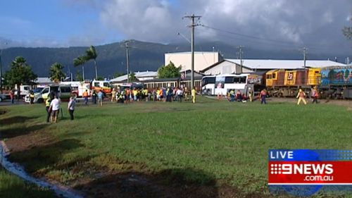 Volunteers and paramedics set up a makeshift triage centre near the scene of the accident. (9NEWS)
