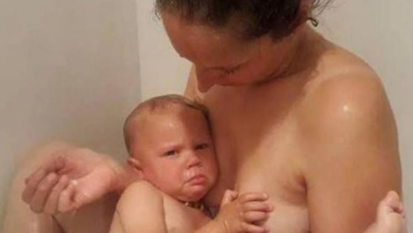An inconsolable baby Ziggy in the shower with his mother. Image: Instagram/@raisingziggy