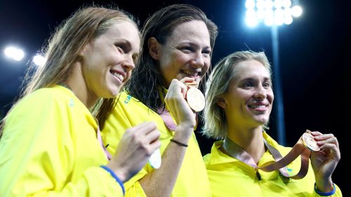 Holly Barratt, Cate Campbell and Madeline Groves with their medals. (Getty)
