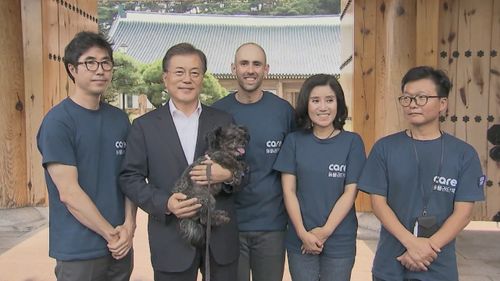 South Korean President Moon Jae-in holds his dog Tori.