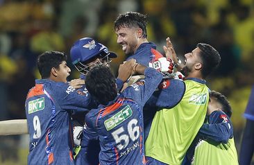 Lucknow Super Giants&#x27; team members lift Marcus Stoinis as they celebrate their win in the Indian Premier League over the Chennai Super Kings.