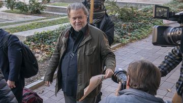 Steve Bannon, centre, a longtime ally of former President Donald Trump, convicted of contempt of Congress, arrives at federal court for a sentencing hearing, Friday, Oct. 21, 2022, in Washington.  