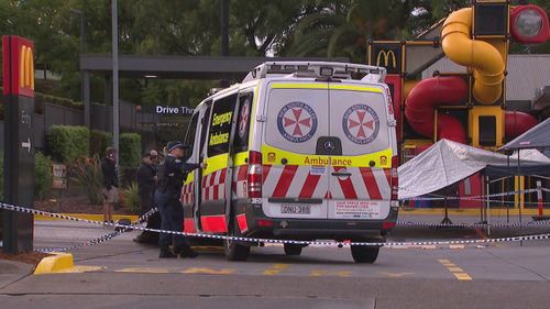 A paramedic was stabbed to death outside a Sydney McDonald's.