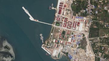 Satellite photos of Chinese warships raise fears over 'permanent' new base