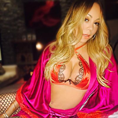 Mariah Carey Big Tits - Mariah Carey dresses as a sexy devil for Halloween party with ex Nick  Cannon and Dem Babies