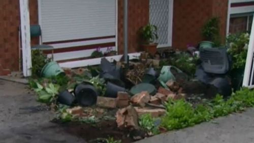 The smash caused extensive damage to the front garden. (9NEWS)
