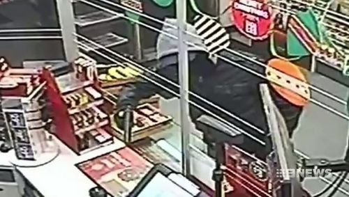 This thief pointed a gun at staff at the 7/11 in Chapel Street.