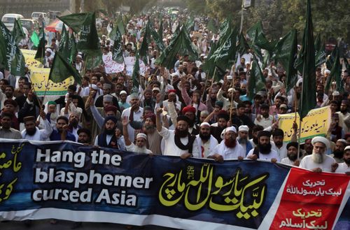 Supporters of Pakistani radical religious Tehreek-e-Labbaik party protest against Christian woman Asia Bibi in Lahore, earlier this month.