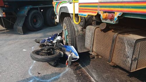 "The driver made an illegal turn and only stopped because his motorcycle was wedged under the wheel so it couldn't move," Mr Bailey said. (Supplied) 