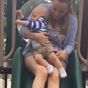 Mum's warning about riding down slides with young children on lap