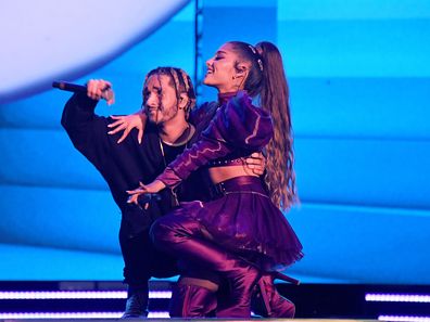 Ariana Grande performs with Mikey Foster