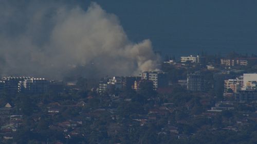 Rockdale warehouse catches on fire sending smoke across city.