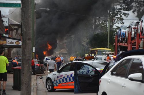 The truck crashed into a building and other vehicles. 