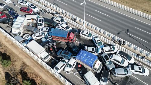 An aerial photo showing the multi-vehicle collision on Zhengxin Yellow River Bridge in Zhengzhou, China, on December 28.