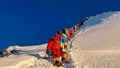	Mountaineers as they climb during their ascend to summit Mount Everest in May 2021.